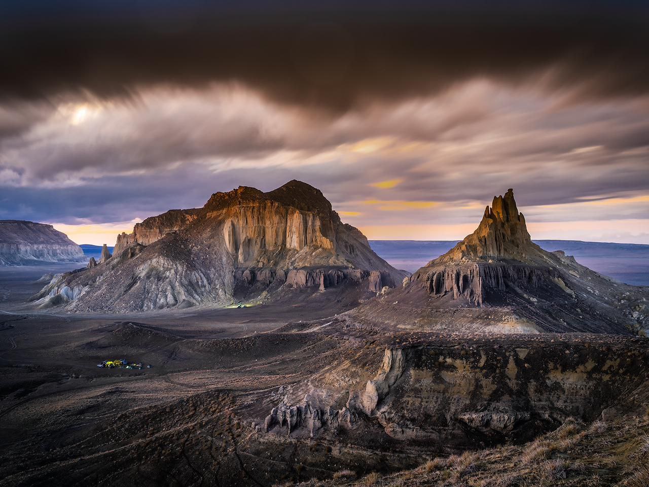 An image of Bozzhira under a stormy sky